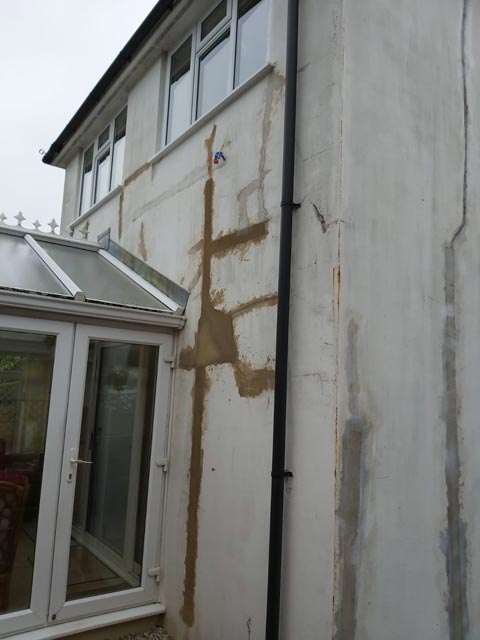 House Exterior Back Cutting Out Loose Render in Bournemouth - Before Photo - Bournemouth Roofing Dorset Poole Christchurch