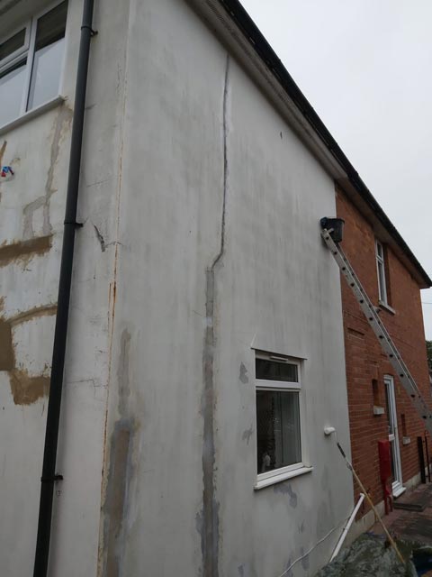 House Exterior Side Cutting Out Loose Render in Bournemouth - Before Photo - Bournemouth Roofing Dorset Poole Christchurch