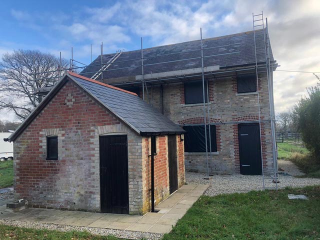 Roof Repairs carried out to Slated Outbuilding During Right Side - Bournemouth Roofing Dorset Poole Christchurch
