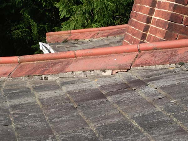 Roof Renovation of Hip and Ridge Tiles Before Photo - Bournemouth Roofing Dorset