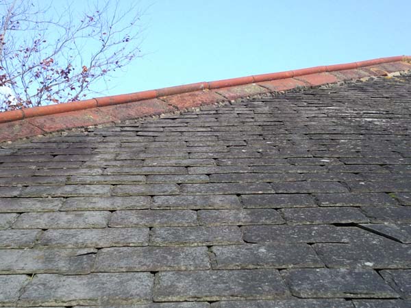 Roof Renovation of Hip and Ridge Tiles Before Photo - Bournemouth Roofing Dorset